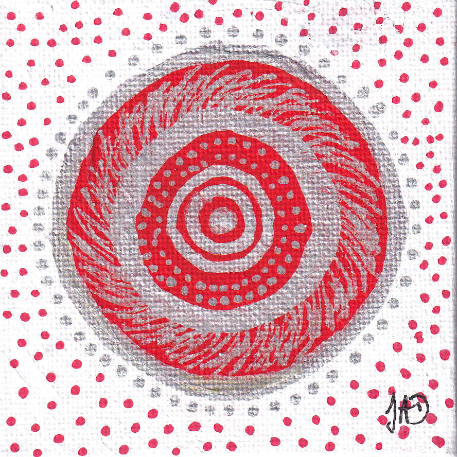 Red Christmas wreath on a white background with red polka dots