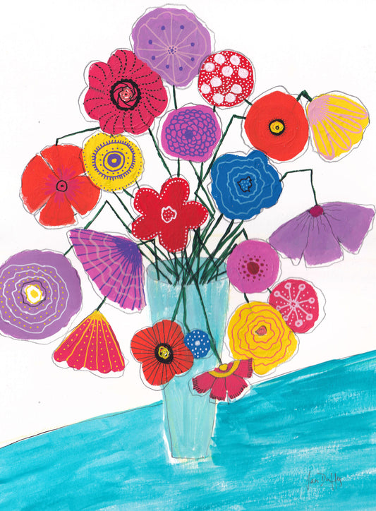 Colorful bouquet of flowers in a vase on a white background