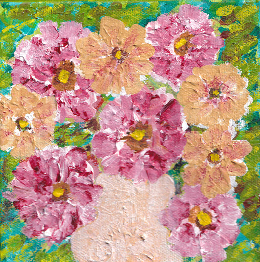 MAGENTA AND PINK FLOWERS IN CREAMY PINK VASE