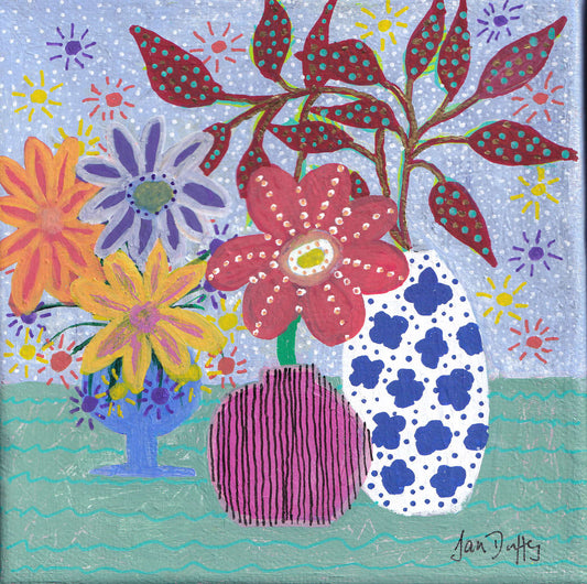 THREE VASES WITH BIG RED FLOWER